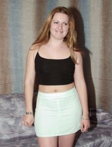 She is a Resize Lady and is posing in front of the camera.