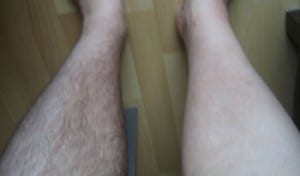 A man dressed as Sean Legs is posing for pictures.