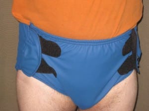 He is a poly man and is wearing blue pants.