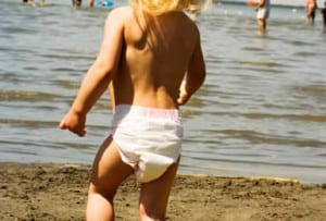 A Small Lady in Diapers, she is donning a white diaper.