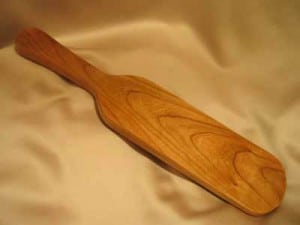 One made of hickory The wooden paddle is practical for beating.
