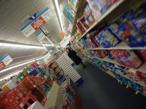 There were numerous racks in a department store.