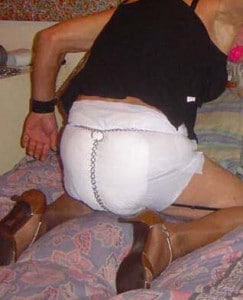 She is dressed in all-black and exudes eroticism while looking like a gorgeous diaper lady.