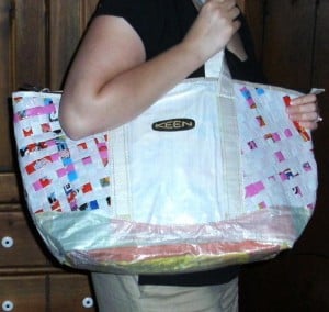 Cropped Shoulder Diaper Bag She is dressed in all-black