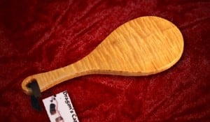 The short paddle has a work surface that is around 12 inches diameter.