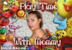 Playtime With Mommy Lauren, who is seated on a bed and is barefoot