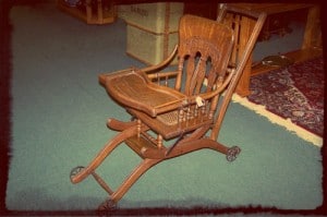 A chair is on display and it appears shiny and lovely.