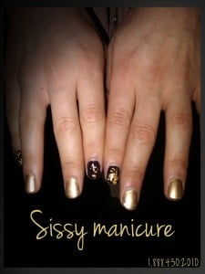 A girl displays her hand to show off her attractive nail paint.