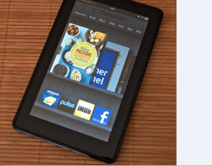 On the table, a kindle advertisement was left.