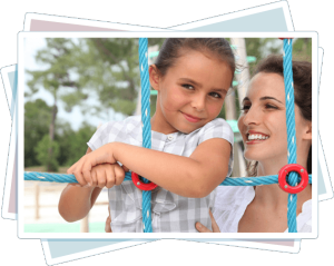 There was a baby playing on the rope slider in the slider pose.