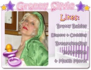 A granny Sue is shown in a nude stance. She is attractive and sexy, and her grin is adorable.