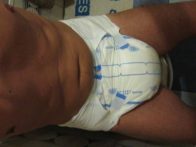 A Man in a Diaper, he is wearing a diaper