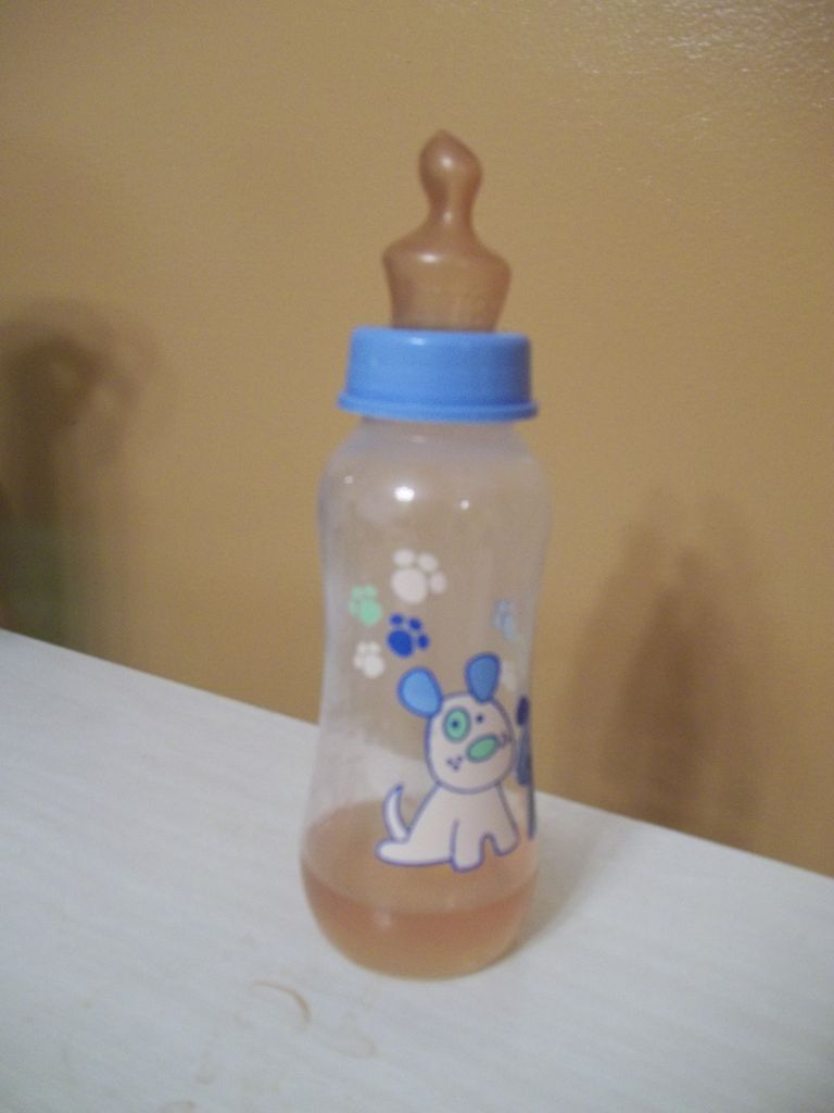 A baby feeding bottle that was kept in front of the photo shoot was filled with pee.