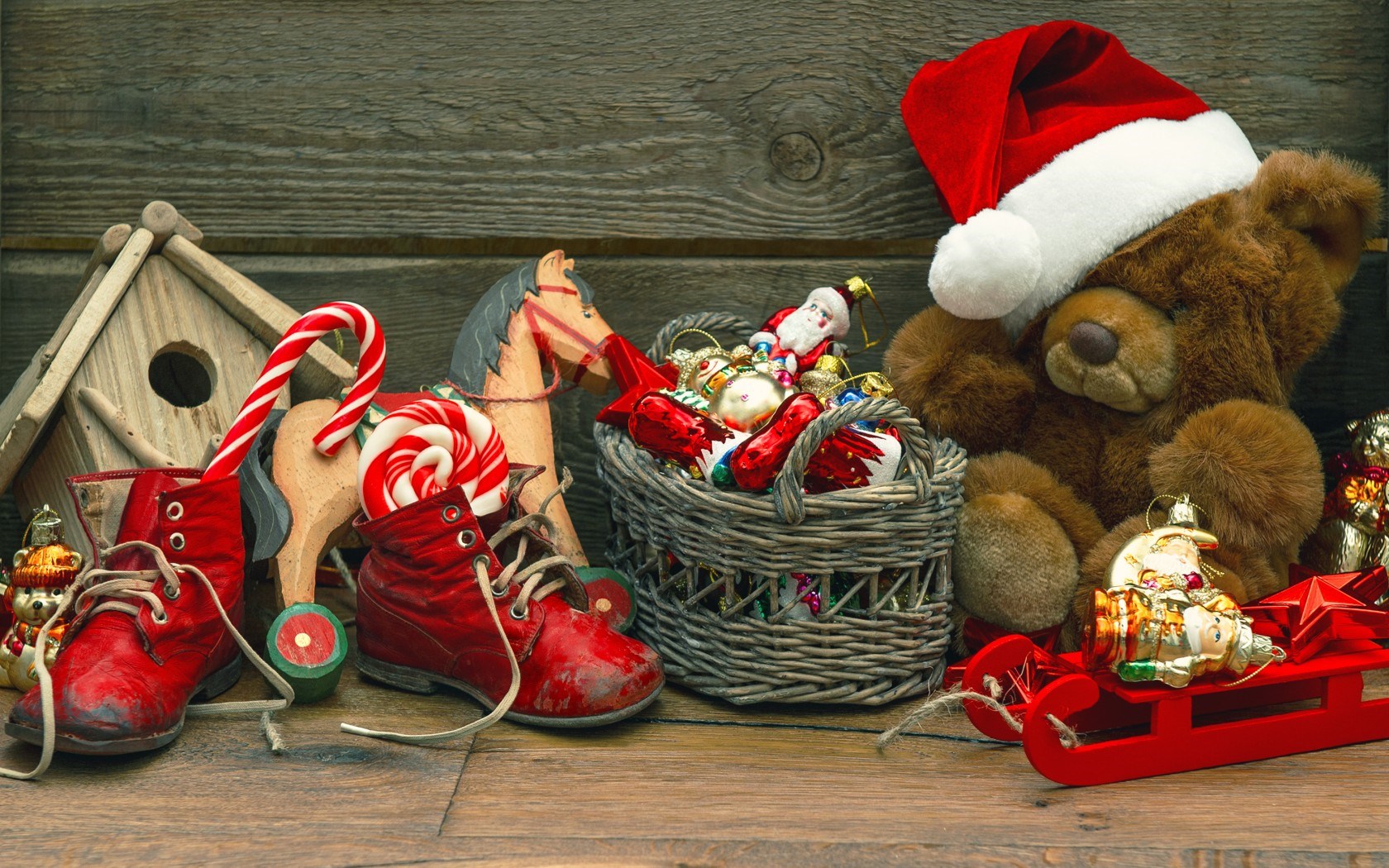 There are displays of Christmas decorations, including teddy bears, Christmas hats, shoes, and other items.