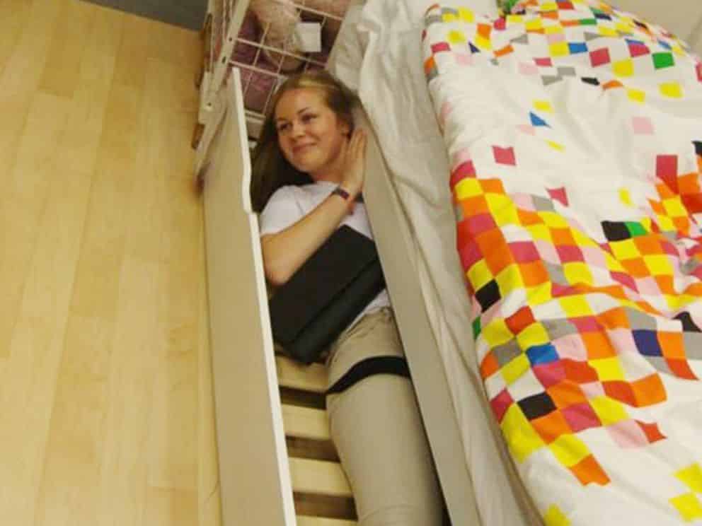 A lovely woman resting on the bed seems beautiful and hot.
