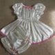 The photo depicts a nice-looking diaper and a sexy dress.