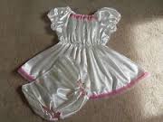 The photo depicts a nice-looking diaper and a sexy dress.