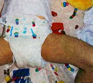 The diaper is being worn by a boy, and it looks good.