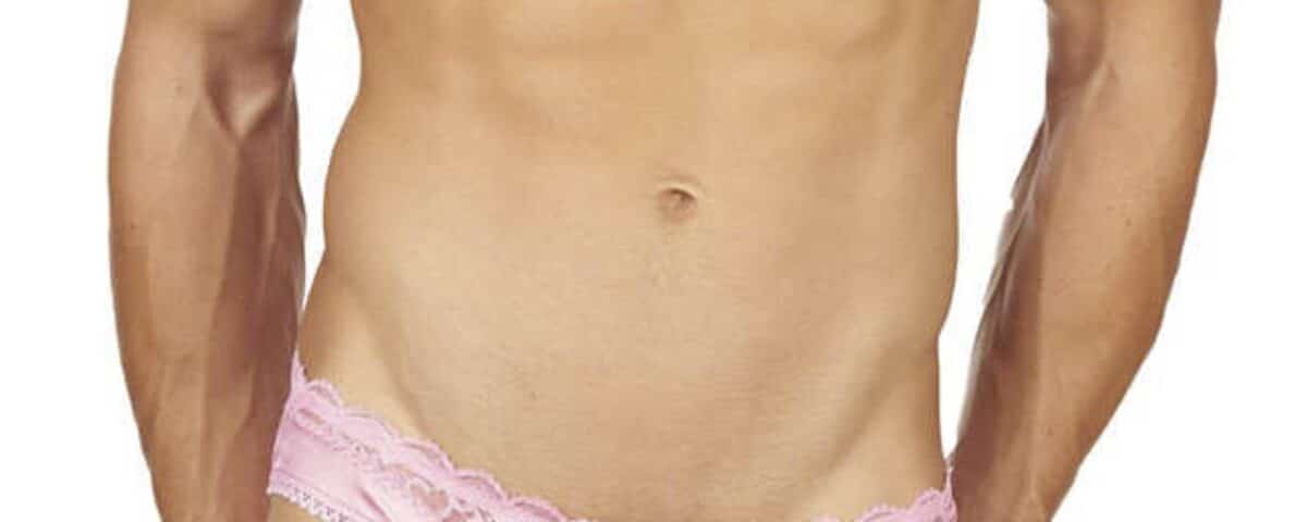 He is a standing adult Sissy Baby boy and is sporting a pink bra and underwear for the photo session.