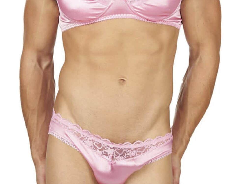 He is a standing adult Sissy Baby boy and is sporting a pink bra and underwear for the photo session.