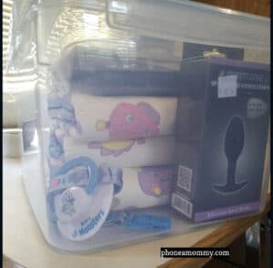 A gorgeous diaper is displayed in the packaging, and it has a soft, sensuous appearance.