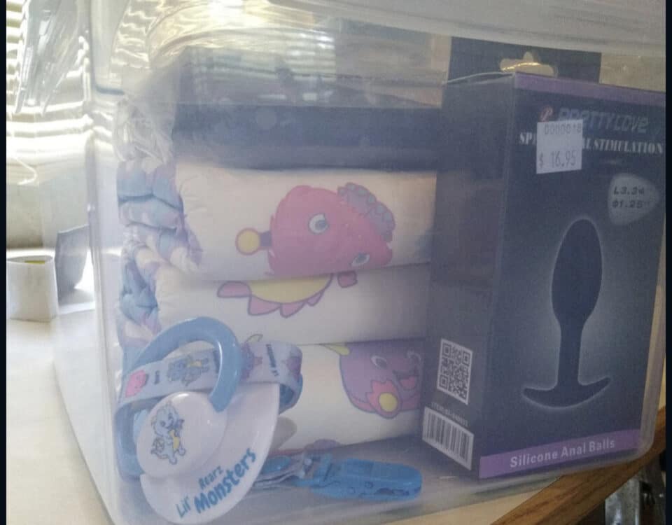 A gorgeous diaper is displayed in the packaging, and it has a soft, sensuous appearance.