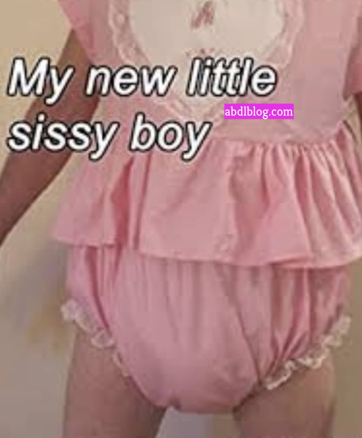 Standing there in the pink diaper is a hot dude.